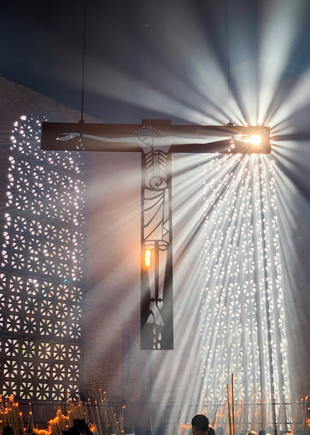 Overhead stage lighting rig with warm spotlights