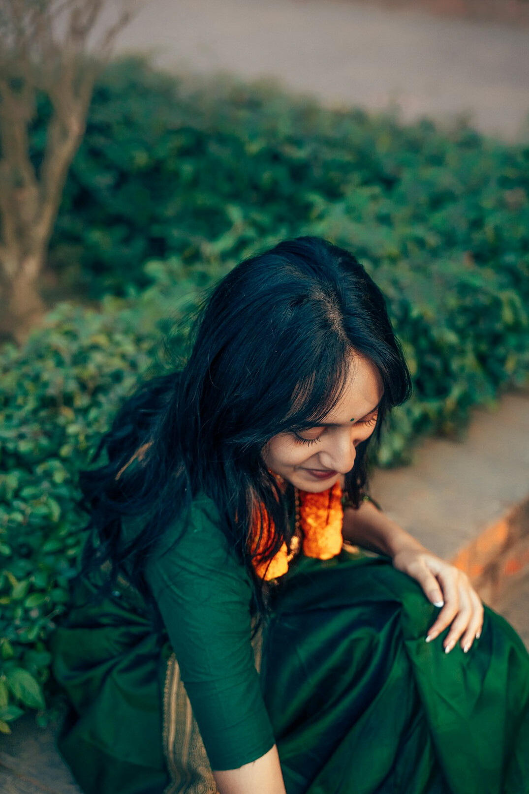 Portrait of a young South Asian woman with long dark hair